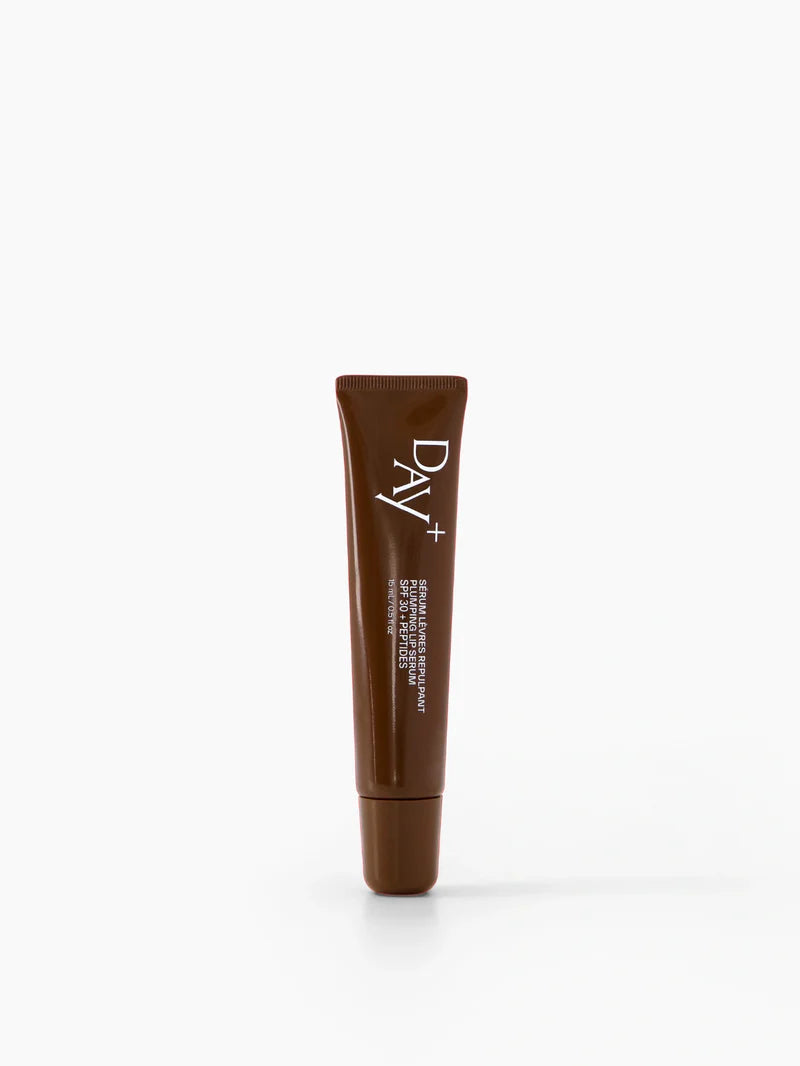Sérum lèvres Chocolat Day+ tube design, soin et couleur pour des lèvres brillantes et hydratées.